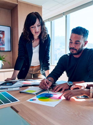 Colleagues reading documents